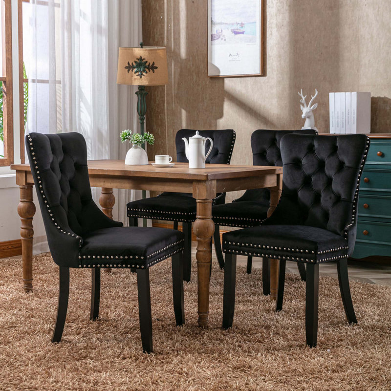 Chaise rembourrée capitonnée en velours de bois massif