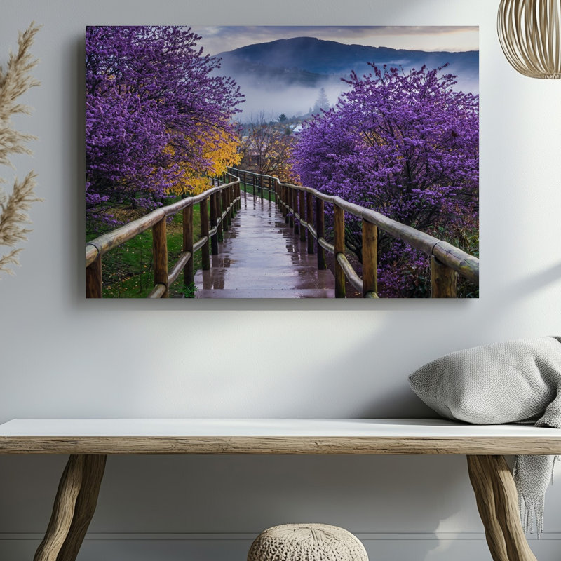 Toile, un sentier serein serpente à travers un paysage animé encadré par des arbres lavande en fleurs et un riche feuillage mauve