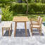 Ensemble de salle à manger 4 pièces en bois d'acacia avec chaise empilable Mauricio