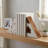 Decorative Leather Cow Print Bookends For Home Decor - Modern Book Ends For Shelf,Office Desk, And Bookshelf Decor Accent - Set Of 2, 7", Ivory & White