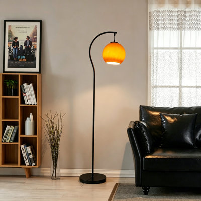 Lampe sur pied moderne avec abat-jour sphérique en verre orange et lampe sur pied en fer noir