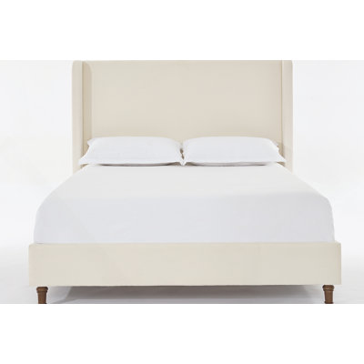 Elegant Upholstered Bed With High Headboard, Soft Wing-Like Backrest, Solid Wood Feet, And Sturdy Metal Frame For Comfortable Sleep