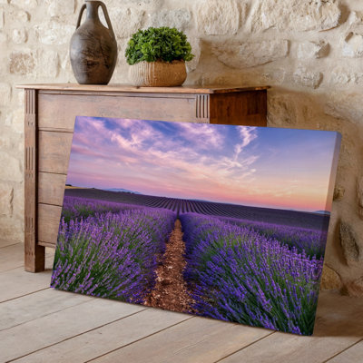 Canvas A Serene Lavender Field Stretches Into The Horizon Under A Wall Art Pastel Sky At Dawn With Soft Pink And Light Purple Creating Canvas Wall Art