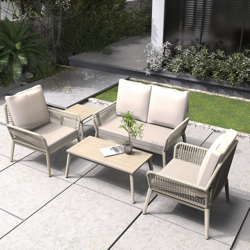 Ensemble de conversation d'extérieur en bois d'acacia pour 4 personnes avec coussins Beryna