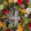 Couronne de fleurs artificielle orange et jaune avec mousse et brindille 12 po