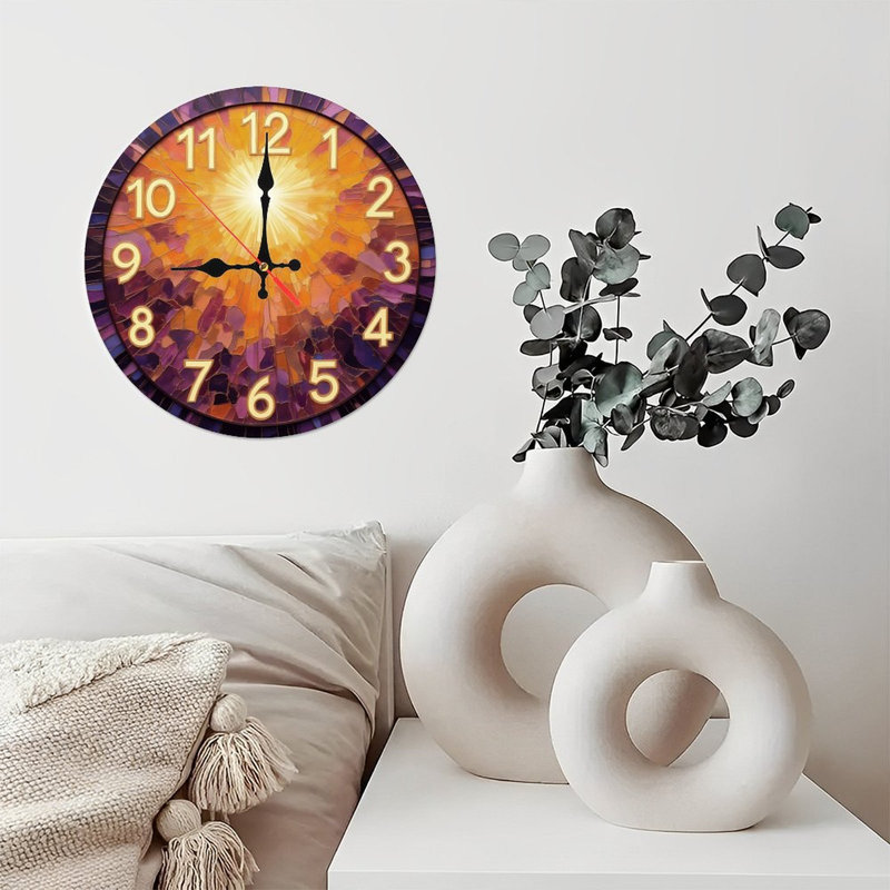 Horloge mosaïque avec soleil levant