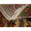 Kathrynne Oriental Area Rug in Beige