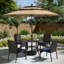 Ensemble de salle à manger de patio 6 pièces 4 fauteuils en rotin et table ronde en métal avec parasol-746054185