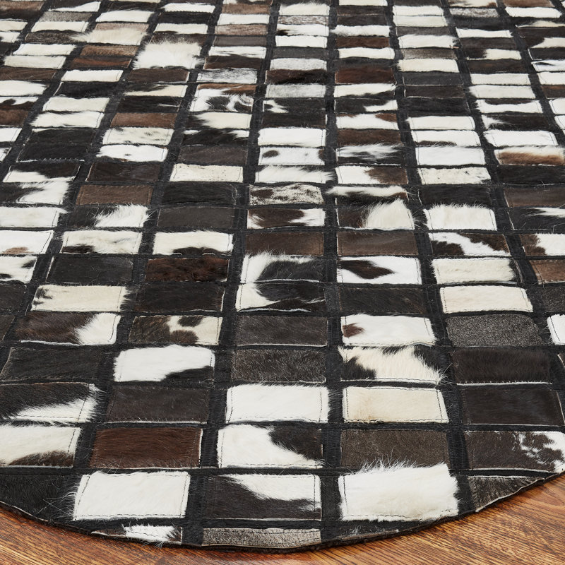 Breyen Cowhide Patchwork Area Rug in Black/White/Brown, Novelty 5'6" x 8'6"