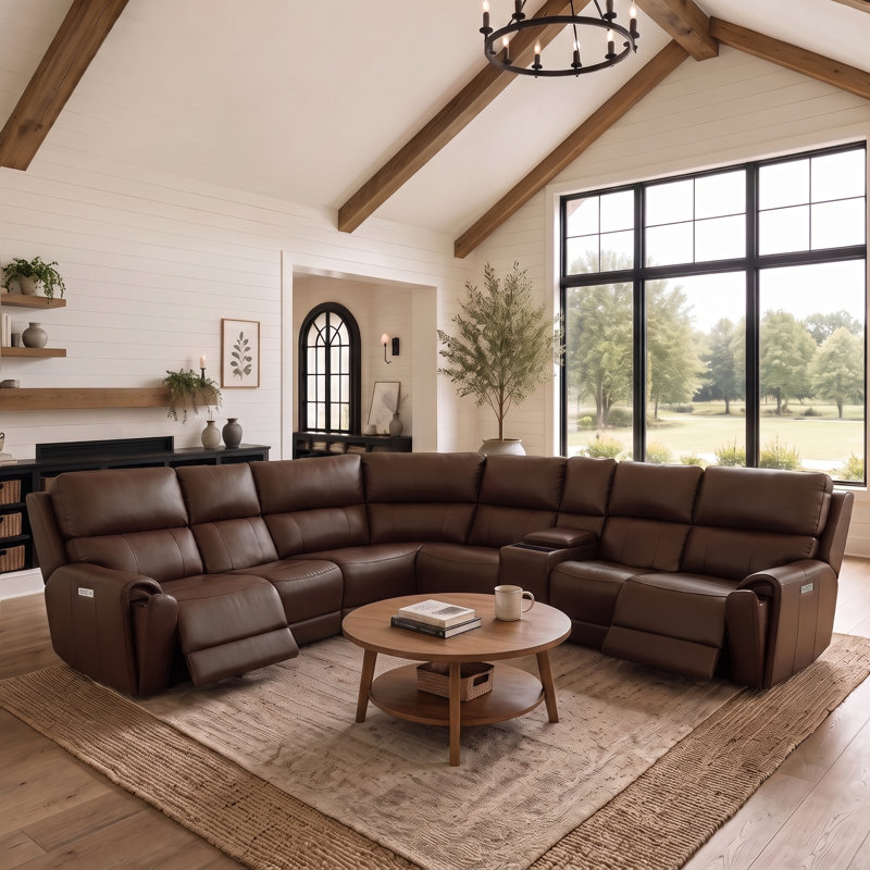Canapé d'angle modulaire en cuir 6 places avec fonction électrique, fauteuil multifonctionnel sans accoudoirs et console.