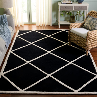 Tapis noir / blanc en laine touffeté à la main Sanyla