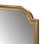 Miroir mural doré