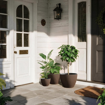 Ensemble de trois pots de fleurs avec motif à carreaux