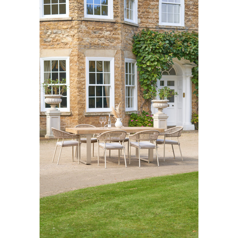 Aveneil 6 - Person Patio Dining Set Table, with Cushions Included