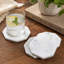 Ensemble de 4 sous-verres blancs en marbre blanc