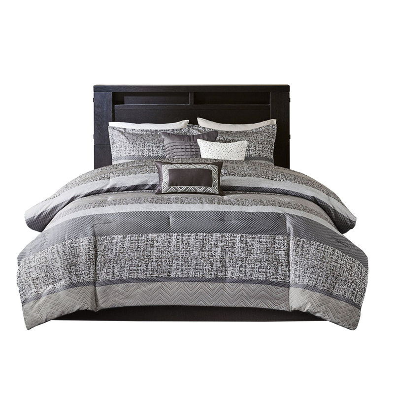 Rhapsody 7 Piece Comforter Queen. Grey/taupe . Luxury Fabric. Comprises Comforter, Shams, Pillows, Bed Skirt. Washable Grey/taupe. With Pleated Details. Includes Decorative