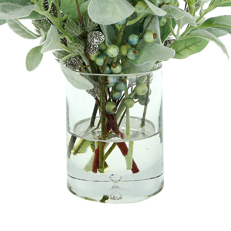 Arrangement floral mélangé dans un vase