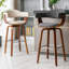 Tabouret tournant Valazquez, revêtement en tissu, pieds en bois de noyer-1121516039