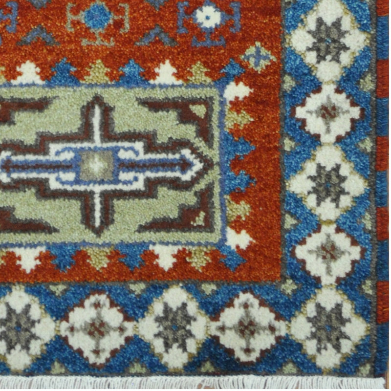 Tapis de zone en laine 2 pi x 4 po one-of-kind noué la kazak rouille