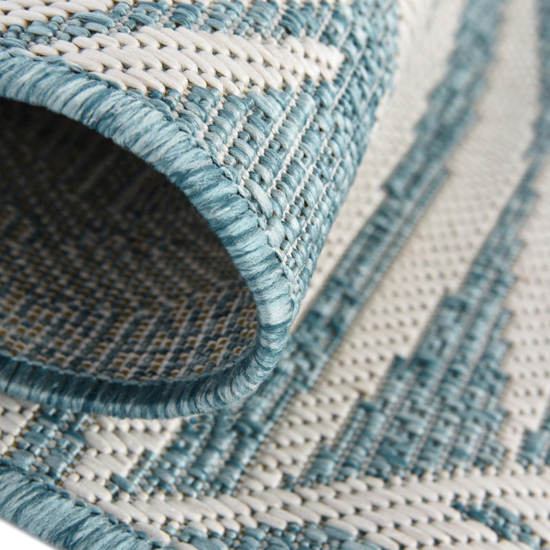 Pinion Floral Machine Woven Polypropylene Indoor / Outdoor Area Rug in Teal, Rectangle 5'3" x 7'1"