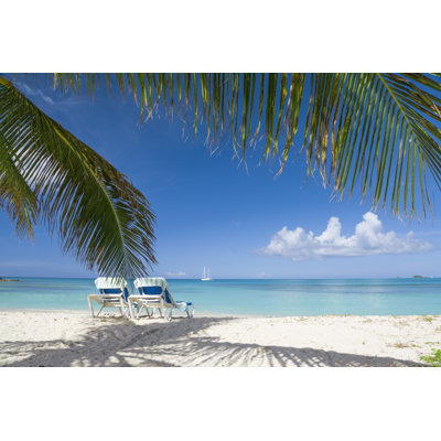 Chairs On A Beach - Wrapped Canvas Print