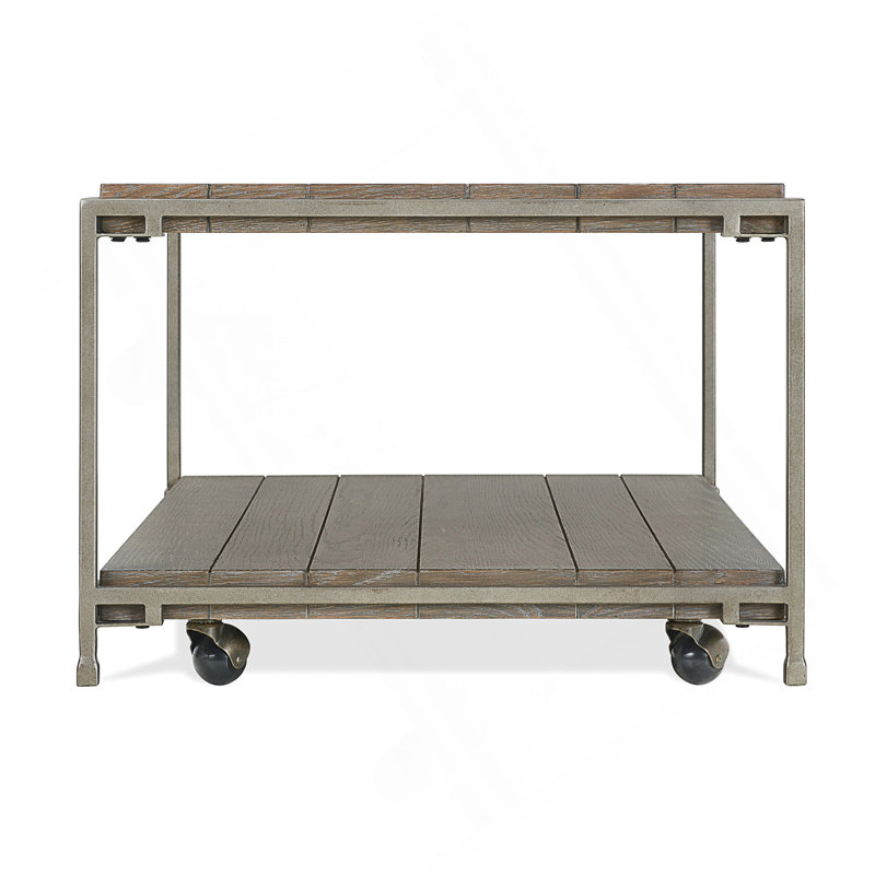 Élégante table basse à structure en métal avec roulettes, parfaite pour les espaces de vie modernes et polyvalents.