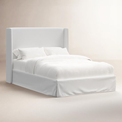 Tilly Skirted Wingback Bed