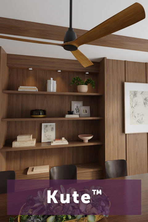 Kute™ ceiling fan with wooden blades installed in a modern dining room featuring built-in wooden shelving and a neutral aesthetic.