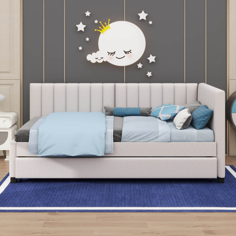 A Upholstered Daybed That Comes With A Built-In Twin-Sized Pull-Out Sofa Bed Frame, Beige
