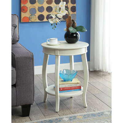 Table d'appoint blanc antique avec pieds ronds et tablette de rangement en bois avec pieds ouverts