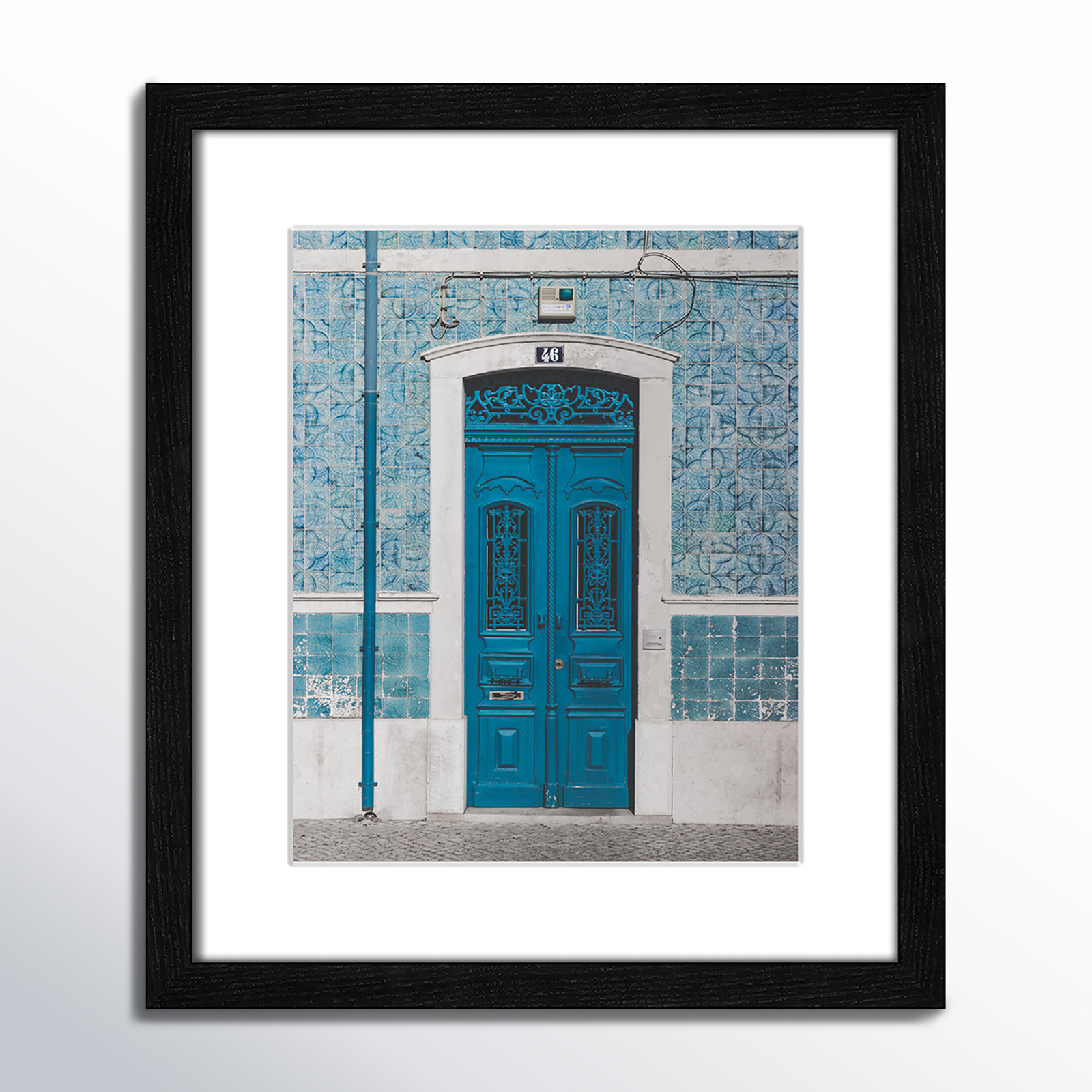 Blue Door Of Caldas De Rainha, Portugual by Catarina Carvalho, 15" H x 13" W x 0.75" D, Black