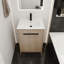 Meuble-lavabo autoportant avec lavabo en céramique blanche et 2 portes d'armoire à fermeture en douceur