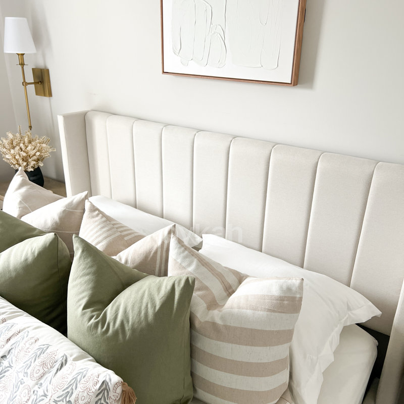 Jenny Upholstered Bed Frame with Storage & Wingback Design