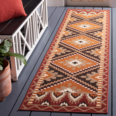 Tapis intérieur / extérieur à motif géométrique rouille / noir Northpoint