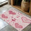 Tapis tressé rose doux-106464040