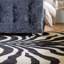 Schell Animal Print Wool Hand Tufted Area Rug-18562471