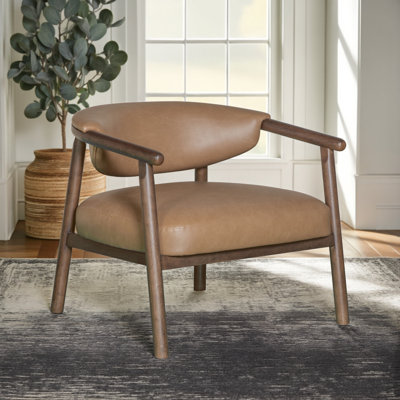  Fauteuil brun en similicuir et bois