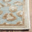 Banerjee Animal Print Area Rug in Stone/Aqua-778425403