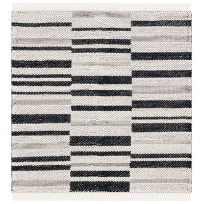 Charvik Machine Made Area Rug in Ivory/Black