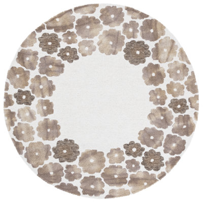 Rudwan Hand Tufted Indian Wool/Cotton Floral Rug in Beige/Ivory