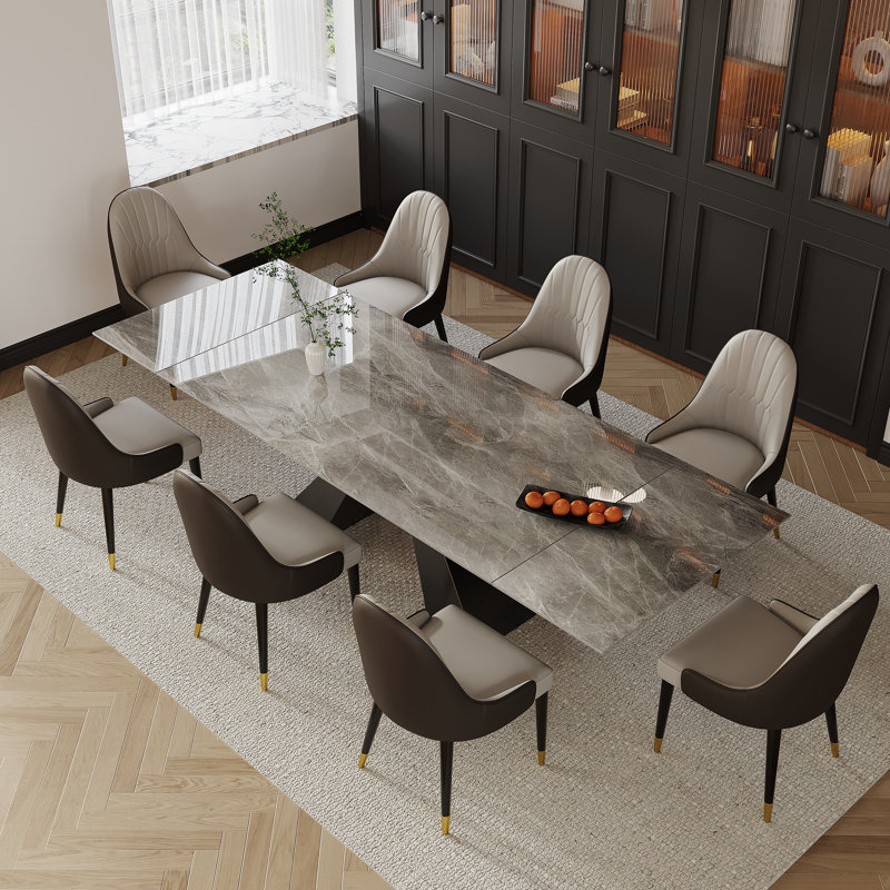 Ensemble de salle à manger à rallonge en pierre frittée avec 8 chaises en cuir 110,23 "Tanjala, Gris italien