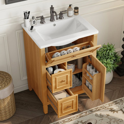 Meuble-lavabo moderne de 24 po avec lavabo central encastré, bois de pin massif et fabrication, porte d'armoire, tiroir rabattable, tablette réglable, surface en céramique facile, poignées dorées élégantes autoportantes de 24 po