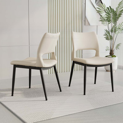 Ensemble de 2 chaises de salle à manger modernes en similicuir noir minimaliste, dossier confortable, support de pieds en métal, utilisation polyvalente pour divers espaces