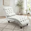 Fauteuil inclinable en velours capitonné