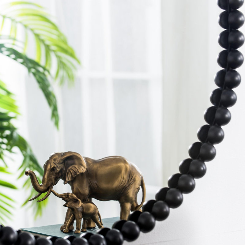 Miroir circulaire avec cadre perlé en métal