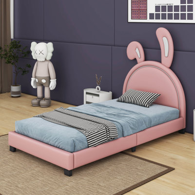 Lit plateforme tapissier en similicuir