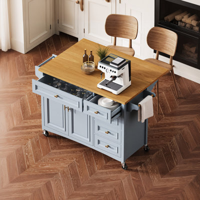 Relief Textured Kitchen Island With Folding Leaf On Wheels by Lark Manor