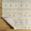 Tapis intérieur / extérieur en polypropylène tissé à la machine en blanc cassé Yumie-2070742971