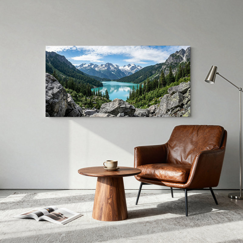 Tableau sur toile représentant des sommets enneigés surplombant un lac turquoise et une forêt de pins, L 20 po x H 10 po