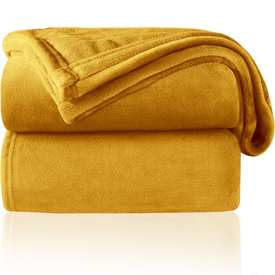 Adamczyk Machine Tufted Throw Blanket